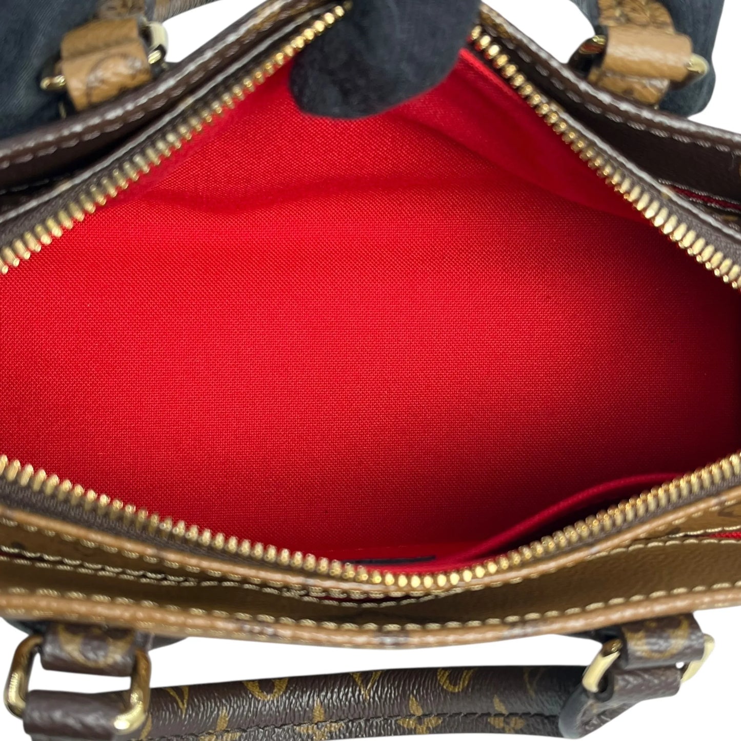 Louis Vuitton Monogram Reverse On The Go EW - Brown