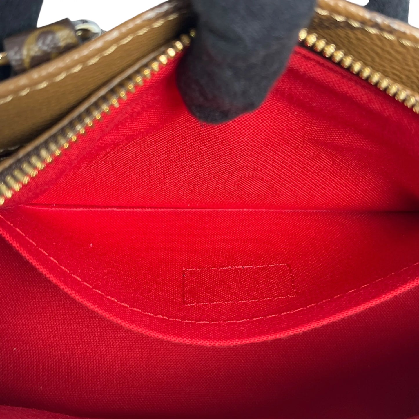 Louis Vuitton Monogram Reverse On The Go EW - Brown