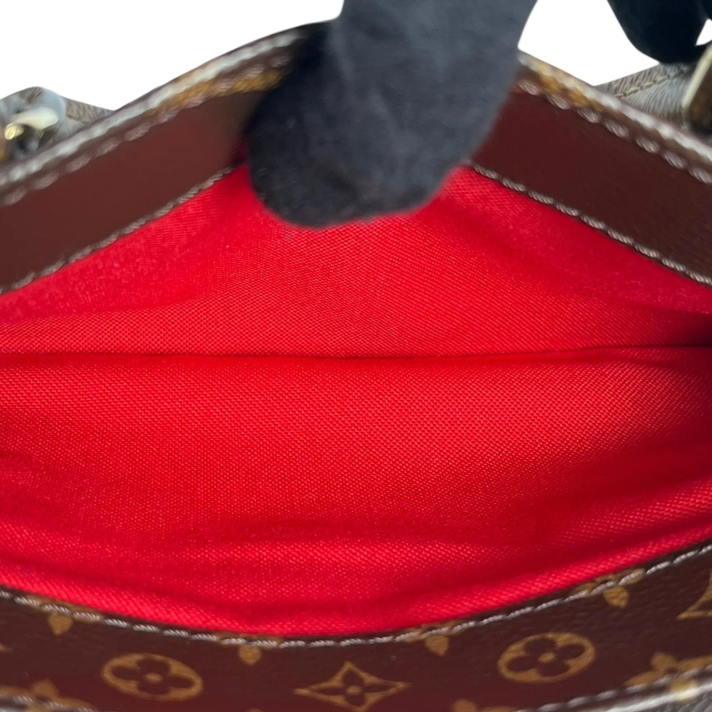 Louis Vuitton Monogram Reverse On The Go EW - Brown