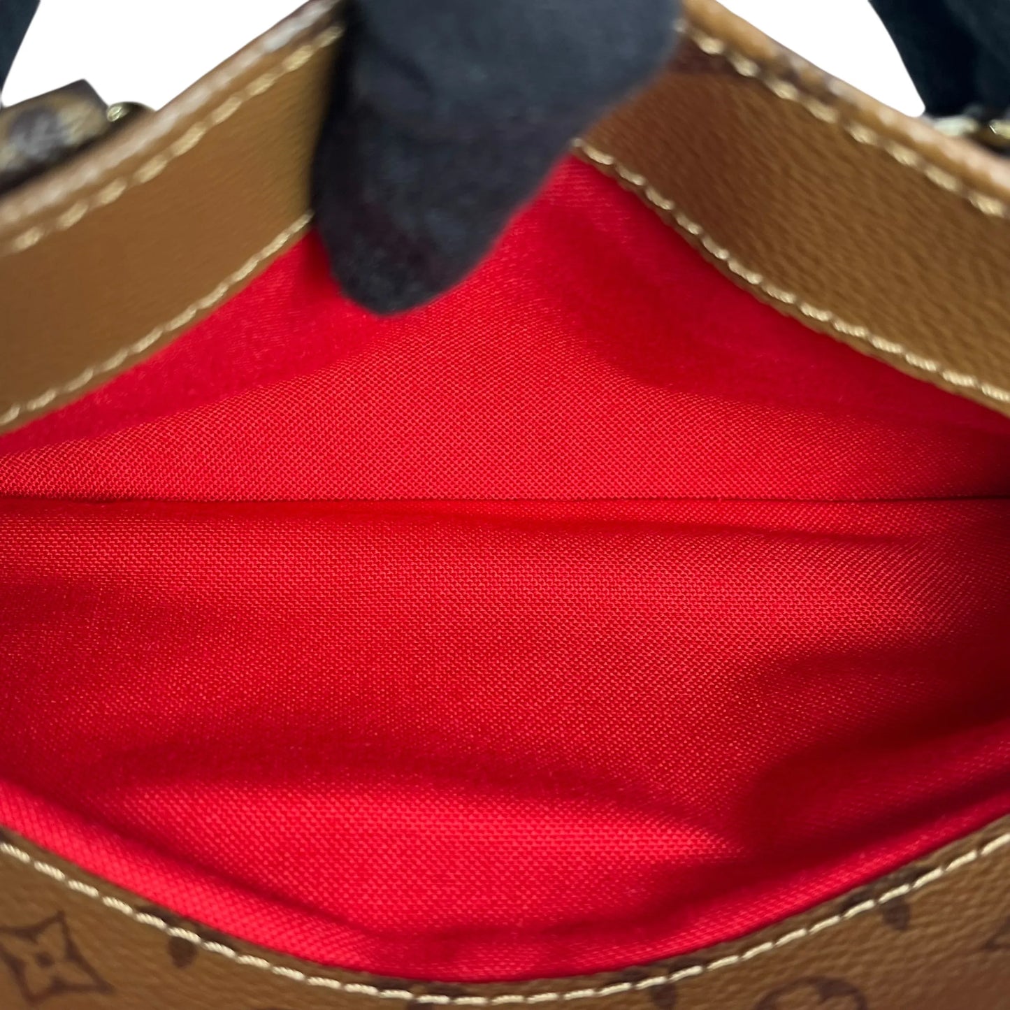 Louis Vuitton Monogram Reverse On The Go EW - Brown