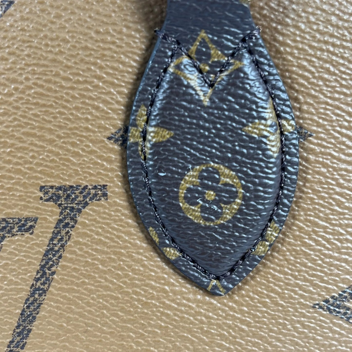 Louis Vuitton Monogram Reverse On The Go EW - Brown