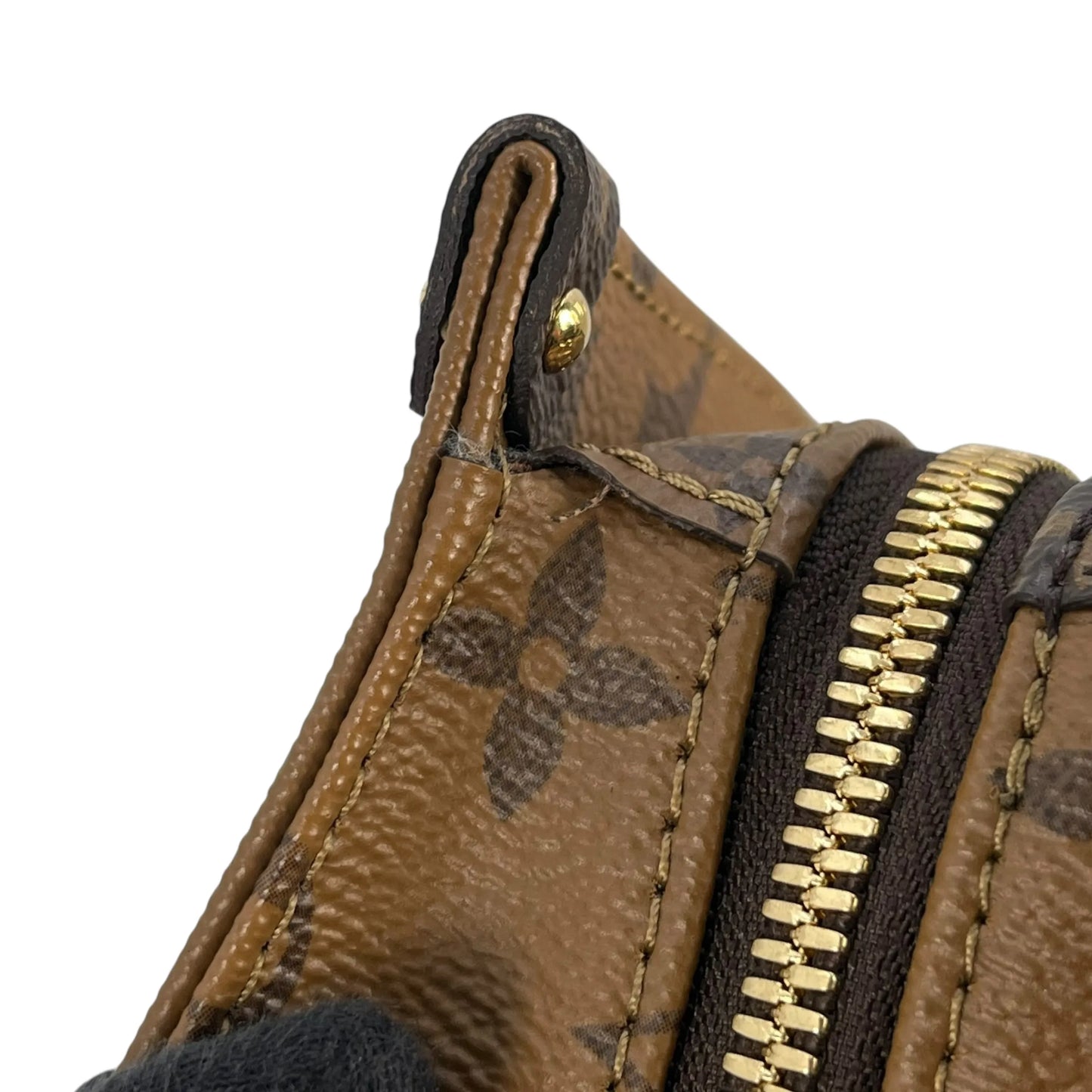 Louis Vuitton Monogram Reverse On The Go EW - Brown