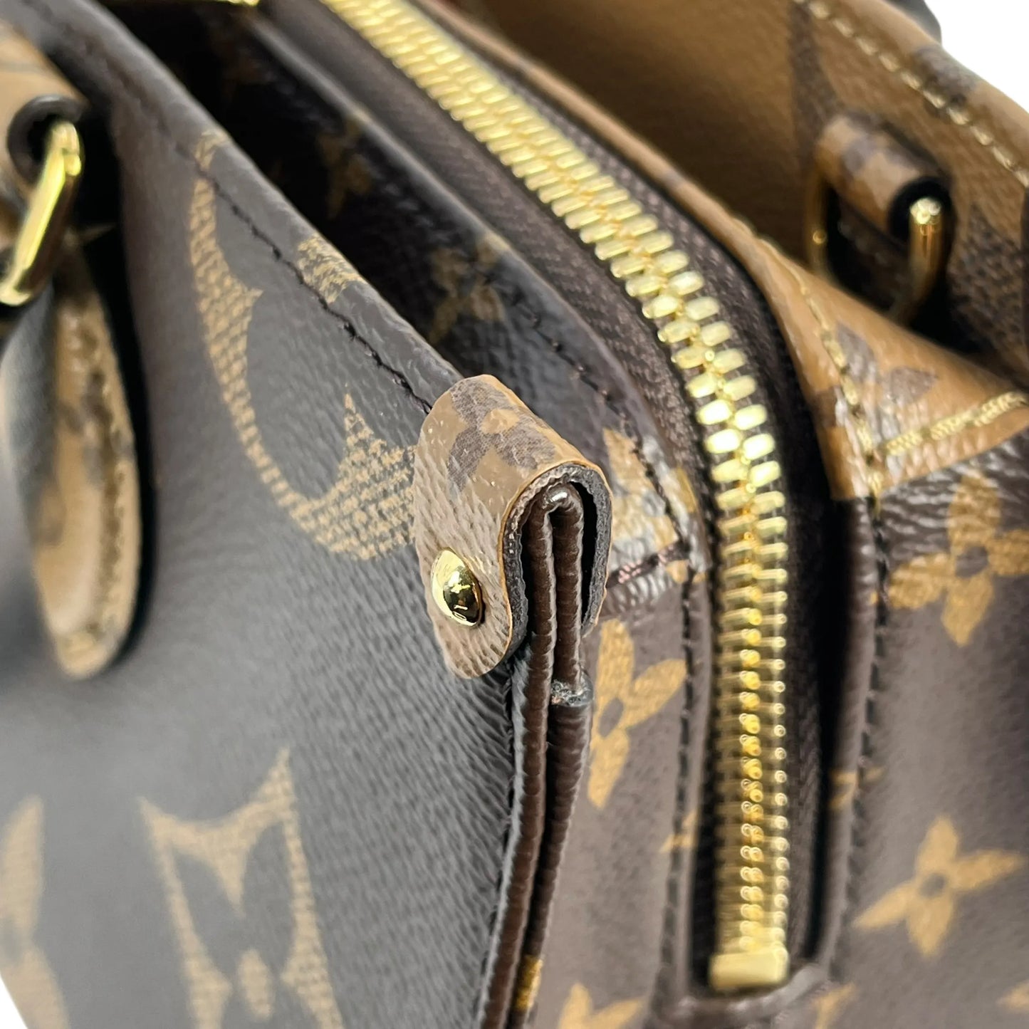 Louis Vuitton Monogram Reverse On The Go EW - Brown