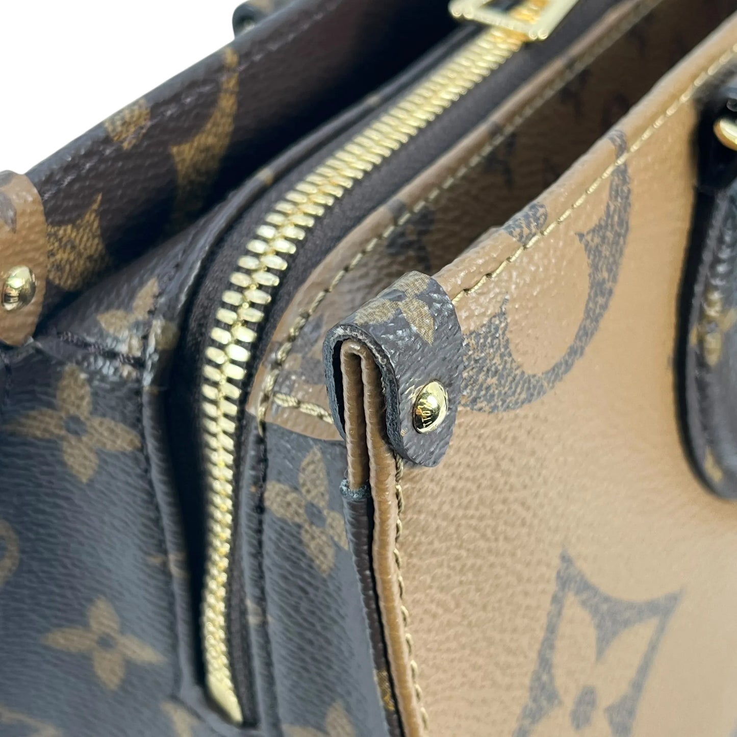 Louis Vuitton Monogram Reverse On The Go EW - Brown