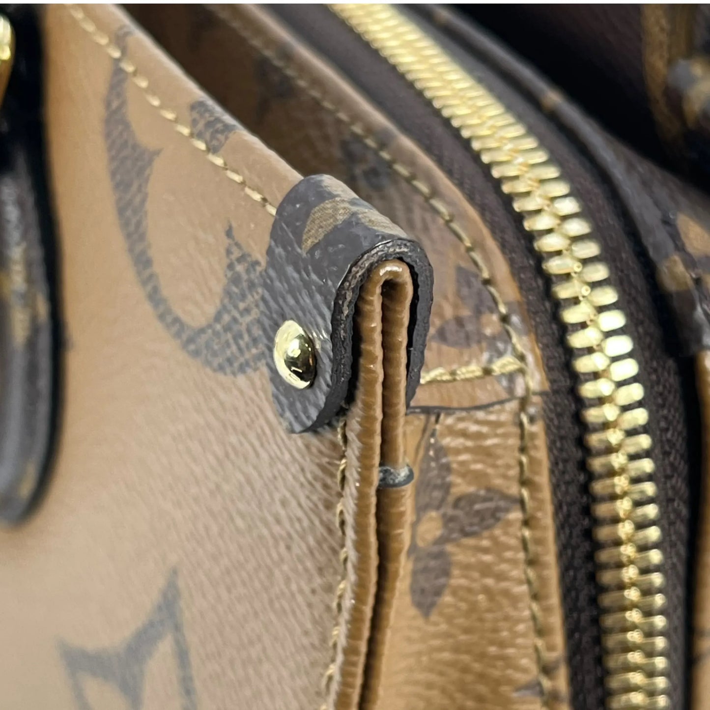 Louis Vuitton Monogram Reverse On The Go EW - Brown