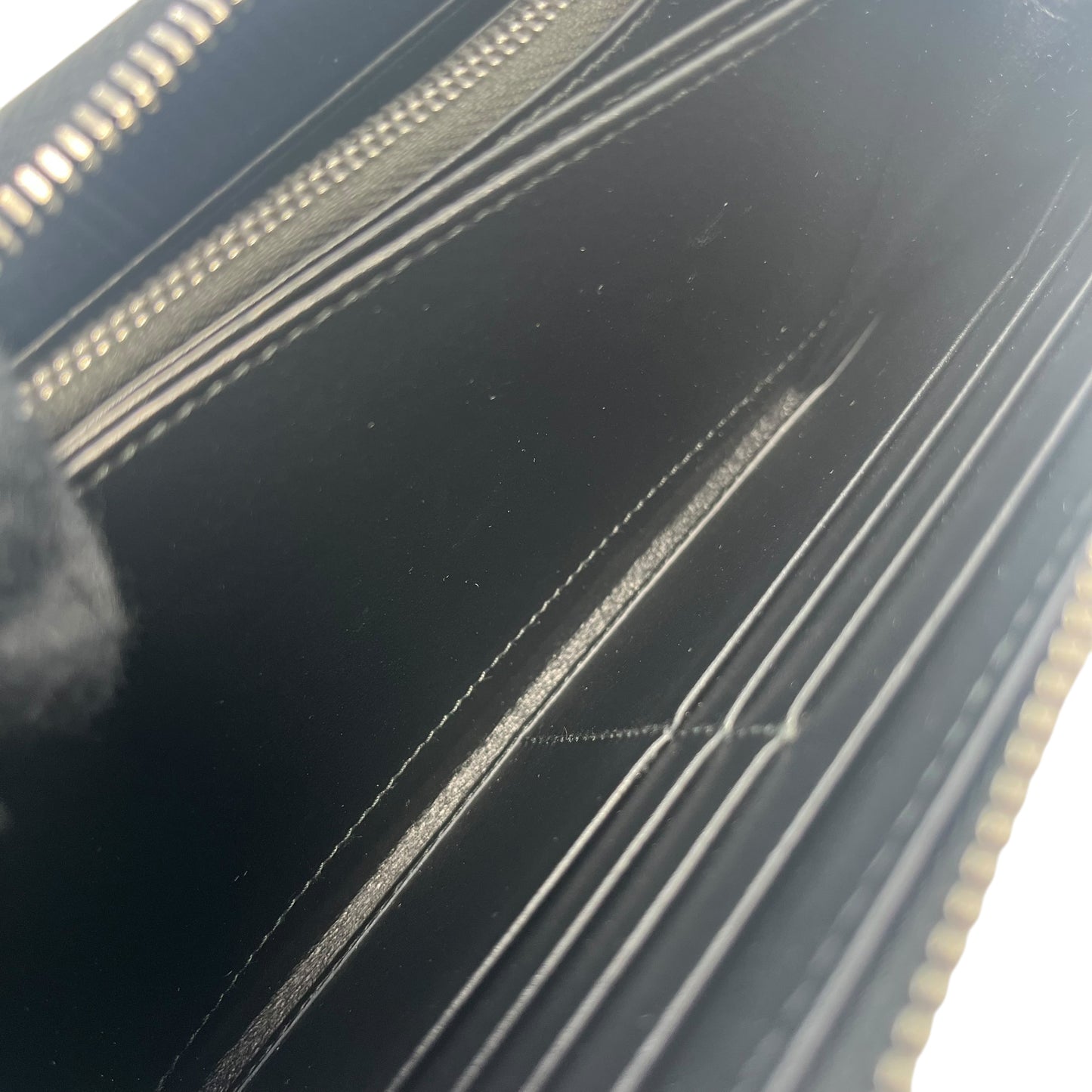 PRADA Saffiano Round Zipper