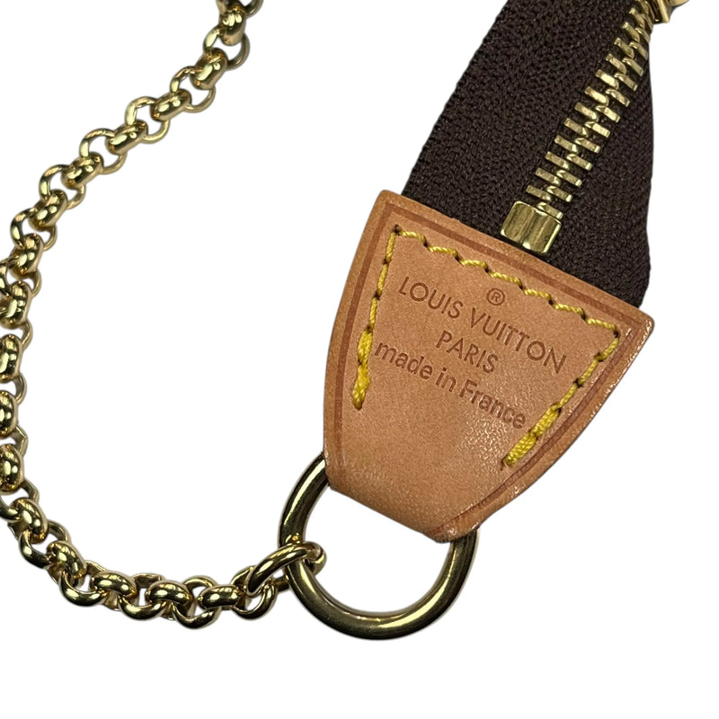 LOUIS VUITTON Eva Clutch Monogram Canvas Shoulder Bag - Brown