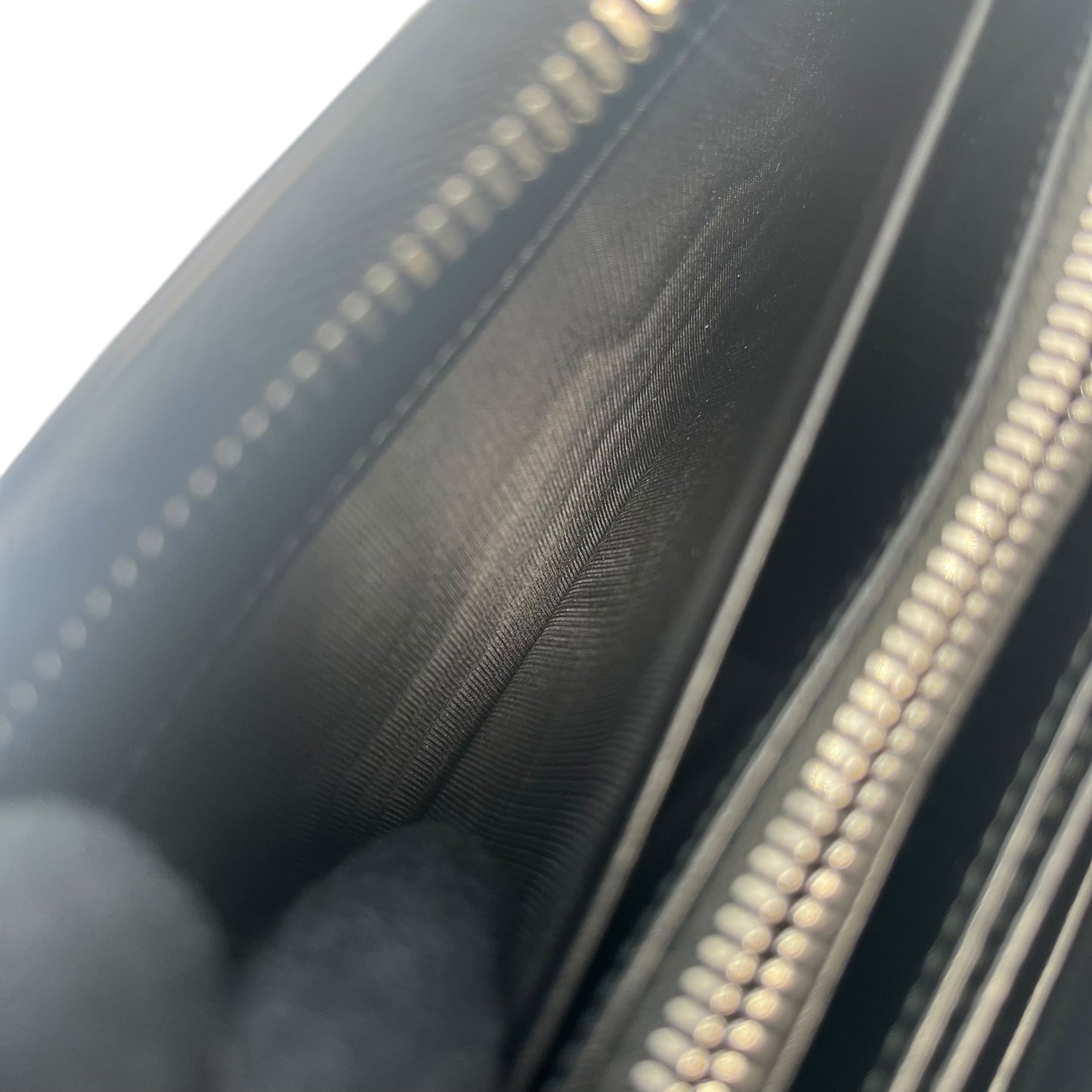 PRADA Saffiano Round Zipper